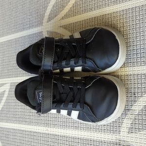 Adidas kids shoes, black with white stripes, size 11